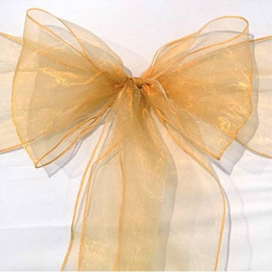 Golden organza chair sash or chair bow or chair tie for hire in Christchurch