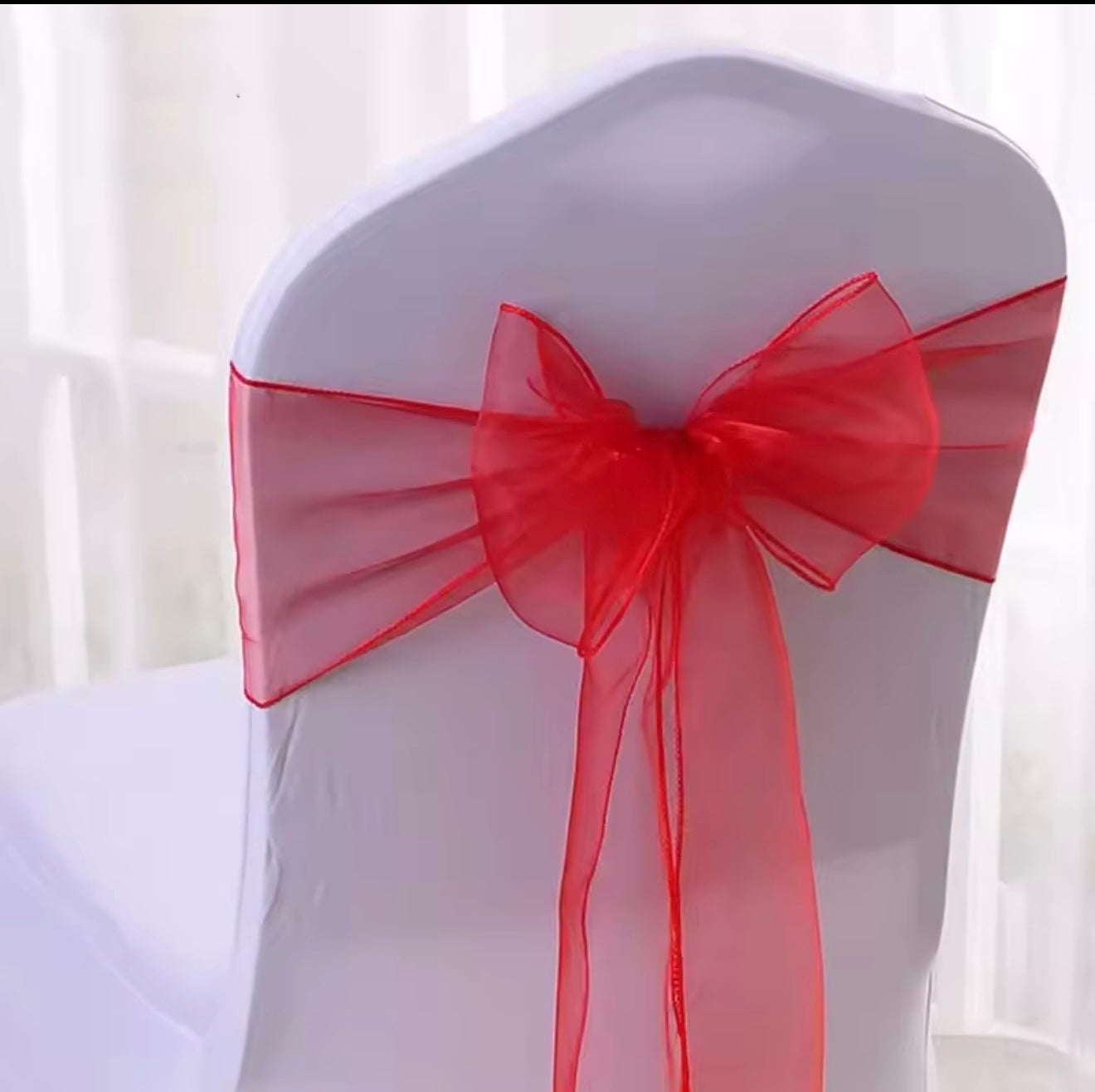 Red organza chair sash for hire in Christchurch